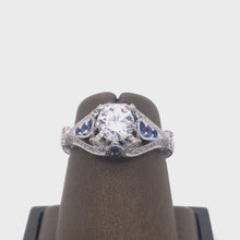 Load and play video in Gallery viewer, 18Kt Gold Semi Mount 0.27 Carat Weight Diamond Ring 0.25 Carat Sapphire on side
